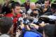 FOXBORO, MA - JULY 26: Tim Tebow #5 interacts with the media after the first day of New England Patriots Training Camp at Gillette Stadium on July 26, 2013 in Foxboro, Massachusetts. (Photo by Jim Rogash/Getty Images)