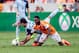 Nov 9, 2013; Houston, TX, USA; Houston Dynamo defender Warren Creavalle (5) and Sporting KC midfielder Benny Feilhaber (10) battle for the ball during the first half of the MLS Eastern Conference Championship soccer game at BBVA Compass Stadium. Mandatory