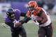 Nov 10, 2013; Baltimore, MD, USA; Cincinnati Bengals running back Giovani Bernard (25) is tackled by Baltimore Ravens cornerback Jimmy Smith (22) at M&T Bank Stadium. The Ravens won 20-17 in overtime. Mandatory Credit: Mitch Stringer-USA TODAY Sports