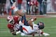 Nov 9, 2013; Bloomington, IN, USA; Indiana Hoosiers defensive tackle Darius Latham (98) sacks Illinois Fighting Illini quarterback Nathan Scheelhaase (2) during the first quarter at Memorial Stadium. Mandatory Credit: Pat Lovell-USA TODAY Sports