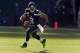 SEATTLE, WA - NOVEMBER 03: Quarterback Russell Wilson #3 of the Seattle Seahawks scrambles out of the pocket during the first quarter of the game at CenturyLink Field on November 3, 2013 in Seattle, Washington. (Photo by Steve Dykes/Getty Images)