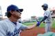 WASHINGTON, DC - JULY 21: Hanley Ramirez #13 of the Los Angeles Dodgers celebrates with mnager Don Mattingly #8 after hitting a home run in the second inning against the Washington Nationals at Nationals Park on July 21, 2013 in Washington, DC. (Photo by