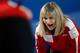 RIGA, LATVIA - MARCH 24: Erika Brown of USA screams instructions to team mates in the Bronze medal match between USA and Canada on Day 9 of the Titlis Glacier Mountain World Women's Curling Championship at the Volvo Sports Centre on March 24, 2013 in Rig