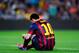 BARCELONA, SPAIN - SEPTEMBER 14: Lionel Messi of FC Barcelona adjusts his boats during the La Liga match between FC Barcelona and Sevilla FC at Camp Nou on September 14, 2013 in Barcelona, Spain. (Photo by David Ramos/Getty Images)