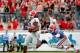 JACKSONVILLE, FL - NOVEMBER 02: Todd Gurley #3 of the Georgia Bulldogs runs past Cody Riggs #31 of the Florida Gators during the game at EverBank Field on November 2, 2013 in Jacksonville, Florida. (Photo by Sam Greenwood/Getty Images)