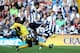 WEST BROMWICH, ENGLAND - SEPTEMBER 21: Scott Sinclair of West Bromwich Albion tackled by Modibo Diakite of Sunderland during the Barclays Premier League match between West Bromwich Albion and Sunderland at The Hawthorns on September 21, 2013 in West Brom
