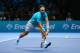 LONDON, ENGLAND - NOVEMBER 11: Rafael Nadal of Spain hits a backhand in his men's singles final match against Novak Djokovic of Serbia during day eight of the Barclays ATP World Tour Finals at O2 Arena on November 11, 2013 in London, England. (Photo by