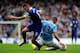 MANCHESTER, ENGLAND - OCTOBER 05: Kevin Mirallas of Everton and Aleksandr Kolarov of Manchester City compete for the ball during the Barclays Premier League match between Manchester City and Everton at Etihad Stadium on October 5, 2013 in Manchester, Eng