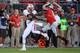 COLUMBUS, OH - SEPTEMBER 28: Jared Abbrederis #4 of the Wisconsin Badgers pulls in a 36-yard touchdown pass in the first quarter as Bradley Roby #1 of the Ohio State Buckeyes defends at Ohio Stadium on September 28, 2013 in Columbus, Ohio. (Photo by Jam