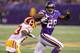 MINNEAPOLIS, MN - NOVEMBER 7: Adrian Peterson #28 of the Minnesota Vikings out runs DeAngelo Hall #23 of the Washington Redskins on November 7, 2013 at Mall of America Field at the Hubert Humphrey Metrodome in Minneapolis, Minnesota. (Photo by Adam Bettch