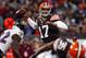 CLEVELAND, OH - NOVEMBER 03: Quarterback Jason Campbell #17 of the Cleveland Browns throws to a receiver as he is pressured by safety James Ihedigbo #32 of the Baltimore Ravens at FirstEnergy Stadium on November 3, 2013 in Cleveland, Ohio. (Photo by Mat