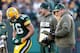 GREEN BAY, WI - NOVEMBER 10: Scott Tolzien #16 of the Green Bay Packers talks with Aaron Rodgers and head coach Mike McCarthy during a fourth quarter time out while playing the Philadelphia Eagles at Lambeau Field on November 10, 2013 in Green Bay, Wiscon