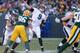 GREEN BAY, WI - NOVEMBER 10: Nick Foles #9 of the Philadelphia Eagles throws a third quarter touchdown while playing the Green Bay Packers at Lambeau Field on November 10, 2013 in Green Bay, Wisconsin. Philadelphia won the game 27-13. (Photo by Gregory Sh