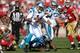 SAN FRANCISCO, CA - NOVEMBER 10: Cam Newton #1 of the Carolina Panthers scrambles for five yards and a first down against the San Francisco 49ers during the first quarter at Candlestick Park on November 10, 2013 in San Francisco, California. (Photo by T