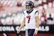 Nov 10, 2013; Phoenix, AZ, USA; Houston Texans quarterback Case Keenum (7) laughs before the game against the Arizona Cardinals at University of Phoenix Stadium. Mandatory Credit: Kevin Jairaj-USA TODAY Sports