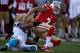 SAN FRANCISCO, CA - NOVEMBER 10: Colin Kaepernick #7 of the San Francisco 49ers is sacked by Greg Hardy #76 of the Carolina Panthers at Candlestick Park on November 10, 2013 in San Francisco, California. (Photo by Ezra Shaw/Getty Images)