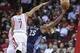 Oct 30, 2013; Houston, TX, USA; Charlotte Bobcats center Al Jefferson (25) shoots the ball during the second quarter as Houston Rockets point guard Jeremy Lin (7) defends at Toyota Center. Mandatory Credit: Troy Taormina-USA TODAY Sports