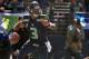 SEATTLE, WA - SEPTEMBER 22: Quarterback Russell Wilson #3 of the Seattle Seahawks scrambles out of the pocket during the third quarter of the game against the Jacksonville Jaguars at CenturyLink Field on September 22, 2013 in Seattle, Washington. (Photo b