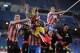 MADRID, SPAIN - MAY 17: Saul Niguez (L) and Radamel Falcao of Club Atletico de Madrid celebrate with the trophy after beating Real Madrid CF 2-1 in the Copa del Rey Final between Real Madrid CF and Club Atletico de Madrid at Estadio Santiago Bernabeu on