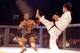 Jiu-Jitsu black belt Royce Gracie kicks at cruiserweight boxer Art Jimmerson during a 1st round match in the Ultimate Fighter Championships in Denver, Colorado. Gracie went on to win the match and eventually the championship. Mandatory Credit: Markus Boes