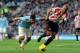 SUNDERLAND, ENGLAND - NOVEMBER 10: Wes Brown of Sunderland in action with Sergio Aguero of Manchester City during the Barclays Premier League match between Sunderland and Manchester City at Stadium of Light on November 10, 2013 in Sunderland, England. (Ph