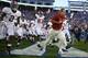 LEXINGTON, KY - OCTOBER 12: Nick Saban the head coach of the Alabama Crimson Tide leads his team on the field before the game against the Kentucky Wildcats at Commonwealth Stadium on October 12, 2013 in Lexington, Kentucky. (Photo by Andy Lyons/Getty Im