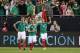 GLENDALE, AZ - JANUARY 30: Marcos Fabian #10 (R) of Mexico celebrates with Aldo De Nigris #9 and Javier Aquino #11 afer Fabian scored against Denmark on a penalty kick during the second half of an international friendly match at University of Phoenix Sta