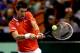 BOISE, ID - APRIL 07: Novak Djokovic of Serbia returns a shot to Sam Querrey during the Davis Cup tie between the United States and Serbia at Taco Bell Arena on April 7, 2013 in Boise, Idaho. (Photo by Matthew Stockman/Getty Images)