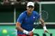 PRAGUE, CZECH REPUBLIC - NOVEMBER 18: Tomas Berdych of Czech Republic runs for a backhand during his straight sets defeat by David Ferrer of Spain during day three of the final Davis Cup match between Czech Republic and Spain at the 02 Arena on November