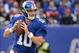 Nov 10, 2013; East Rutherford, NJ, USA; New York Giants quarterback Eli Manning (10) throws in the first quarter against the Oakland Raiders at MetLife Stadium. Mandatory Credit: Robert Deutsch-USA TODAY Sports