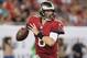 Nov 11, 2013; Tampa, FL, USA; Tampa Bay Buccaneers quarterback Mike Glennon (8) scrambles out of the pocket during the second half of the game against the Miami Dolphins at Raymond James Stadium. Mandatory Credit: Rob Foldy-USA TODAY Sports