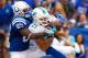 INDIANAPOLIS, IN - SEPTEMBER 15: Brent Grimes #21 of the Miami Dolphins makes an interception against Reggie Wayne #87 of the Indianapolis Colts to seal the game at Lucas Oil Stadium on September 15, 2013 in Indianapolis, Indiana. Miami defeated Indianapo