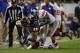 CHICAGO, IL - OCTOBER 10: Michael Bush #29 of the Chicago Bears is tackled by Jon Beason #52 of the New York Giants during the second half on October 10, 2013 at Soldier Field in Chicago, Illinois. The Chicago Bears defeated the New York Giants 27-21. (Ph