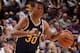 ANAHEIM, CA - OCTOBER 25: Scott Machado #30 of the Utah Jazz brings the ball downcourt during a preseason game at the Honda Center in Anaheim, California on October 25, 2013. NOTE TO USER: User expressly acknowledges and agrees that, by downloading and o