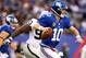EAST RUTHERFORD, NJ - NOVEMBER 10: Eli Manning #10 of the New York Giants scrambles against the Oakland Raiders in the fourth quarter at MetLife Stadium on November 10, 2013 in East Rutherford, New Jersey.The New York Giants defeated the Oakland Raiders