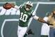 EAST RUTHERFORD, NJ - SEPTEMBER 22: Wide receiver Santonio Holmes #10 of the New York Jets celebrates after his 69 yard touchdown catch in the 2nd half of the Jets 27-20 win over the Buffalo Bills at MetLife Stadium on September 22, 2013 in East Rutherfor