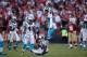 SAN FRANCISCO, CA - NOVEMBER 10: Mike Mitchell #21 of the Carolina Panthers jumps over Drayton Florence #29 of the Carolina Panthers after Florence intercepted the ball late in the fourth quarter of their game against the San Francisco 49ers at Candlesti