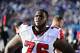 Nov 3, 2013; Charlotte, NC, USA; Atlanta Falcons tackle Lamar Holmes (76) on the sidelines in the third quarter. The Panthers defeated the Falcons 34-10 at Bank of America Stadium. Mandatory Credit: Bob Donnan-USA TODAY Sports