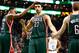 BOSTON, MA - NOVEMBER 01: Zaza Pachulia #27 of the Milwaukee Bucks is congratulated by his teammates after making free-throws late in the fourth quarter against the Boston Celtics during the home opener at TD Garden on November 1, 2013 in Boston, Massachu
