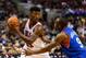 Nov 2, 2013; Philadelphia, PA, USA; Chicago Bulls guard Jimmy Butler (21) is defended by Philadelphia 76ers guard James Anderson (9) during the third quarter at Wells Fargo Center. The Sixers defeated the Bulls 107-104. Mandatory Credit: Howard Smith-USA