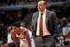 Oct 21, 2013; Chicago, IL, USA; Chicago Bulls head coach Tom Thibodeau and point guard Derrick Rose (1) look on against the Milwaukee Bucks during the second half at the United Center. The Bulls beat the Bucks 105-84. Mandatory Credit: Rob Grabowski-USA T