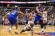 Nov 2, 2013; Philadelphia, PA, USA; Chicago Bulls guard Derrick Rose (1) fights through the defense of Philadelphia 76ers guard Evan Turner (12) and center Daniel Orton (33) during the second quarter at Wells Fargo Center. The Sixers defeated the Bulls 10