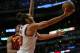 CHICAGO, IL - NOVEMBER 11: Joakim Noah #13 of the Chicago Bulls shoots around Andrew Bynum #21 of the Cleveland Cavaliers at the United Center on November 11, 2013 in Chicago, Illinois. The Bulls defeated the Cavaliers 96-81. NOTE TO USER: User expressly