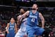 LOS ANGELES, CA - NOVEMBER 11: DeAndre Jordan #6 of the Los Angeles Clippers and Kevin Love #42 of the Minnesota Timberwolves battle for position at Staples Center on November 11, 2013 in Los Angeles, California. NOTE TO USER: User expressly acknowledges