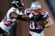 FOXBORO, MA - JANUARY 20: Wes Welker #83 of the New England Patriots breaks a tackle by Ed Reed #20 of the Baltimore Ravens during the 2013 AFC Championship game at Gillette Stadium on January 20, 2013 in Foxboro, Massachusetts. (Photo by Al Bello/Getty