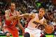 Nov 12, 2013; Miami, FL, USA; Miami Heat small forward Michael Beasley (8) dribbles as Milwaukee Bucks power forward John Henson (31) defends during the second half at American Airlines Arena. The Heat won 118-95. Mandatory Credit: Steve Mitchell-USA TODA