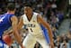 CHICAGO, IL - NOVEMBER 12: Jabari Parker #1 of the Duke Blue Devils moves against Perry Ellis #34 of the Kansas Jayhawks during the State Farm Champions Classic at the United Center on November 12, 2013 in Chicago, Illinois. (Photo by Jonathan Daniel/Get