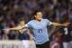 MONTEVIDEO, URUGUAY - OCTOBER 15: Edinson Cavani (#21) of Uruguay celebrates a goal during a match between Uruguay and Argentina as part of the 18th round of the South American Qualifiers for the FIFA's World Cup Brazil 2014 at Centenario Stadium Stadium