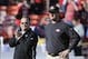 December 30, 2012; San Francisco, CA, USA; San Francisco 49ers head coach Jim Harbaugh (right) and offensive coordinator Greg Roman (left) watch warm ups before the game against the Arizona Cardinals at Candlestick Park. Mandatory Credit: Kyle Terada-USA
