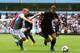 BIRMINGHAM, ENGLAND - SEPTEMBER 28: Edin Dzeko of Manchester City battles with Ron Vlaar of Aston Villa during the Barclays Premier League match between Aston Villa and Manchester City at Villa Park on September 28, 2013 in Birmingham, England. (Photo b